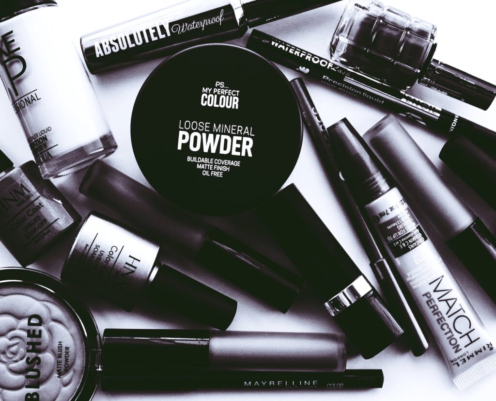 monochrome photo of cosmetics